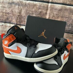 Jordan 1 Mid Black and Orange